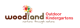 The organisation logo for Woodland Outdoor Kindergartens - Glasgow Southside and West End